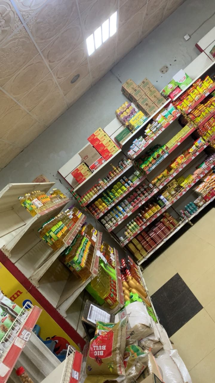 A supermarket aisle stocked with provisions